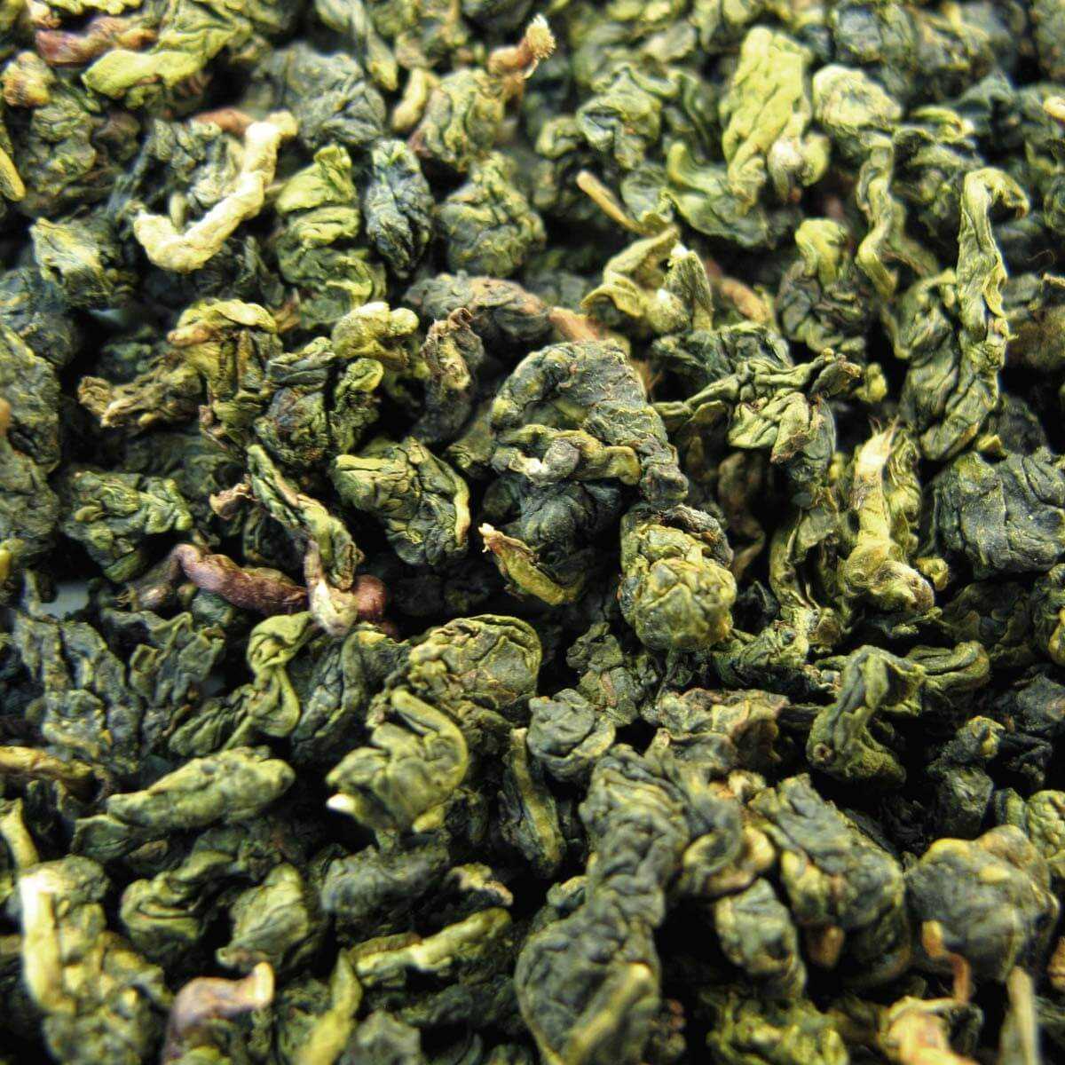 Китайские чаи польза и вред. Зелёный чай молочный улун. Чай молочный оолонг зеленый. Китайский зеленый чай улун. Чай молочный улун это зеленый чай.